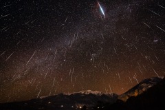 Meteor shower over mountains