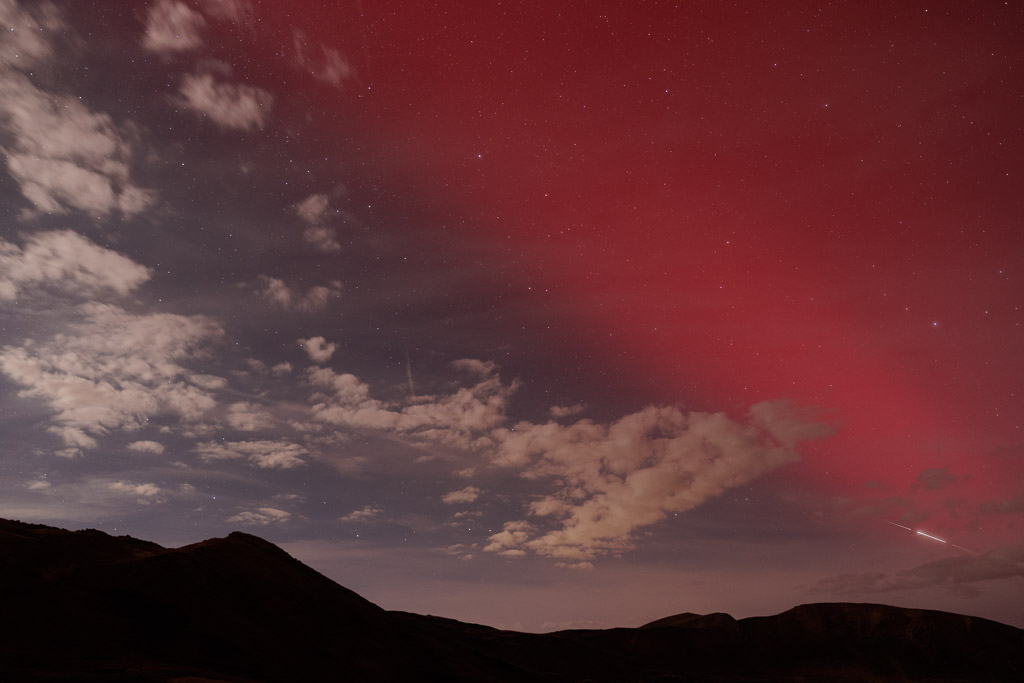 red night sky and satellite